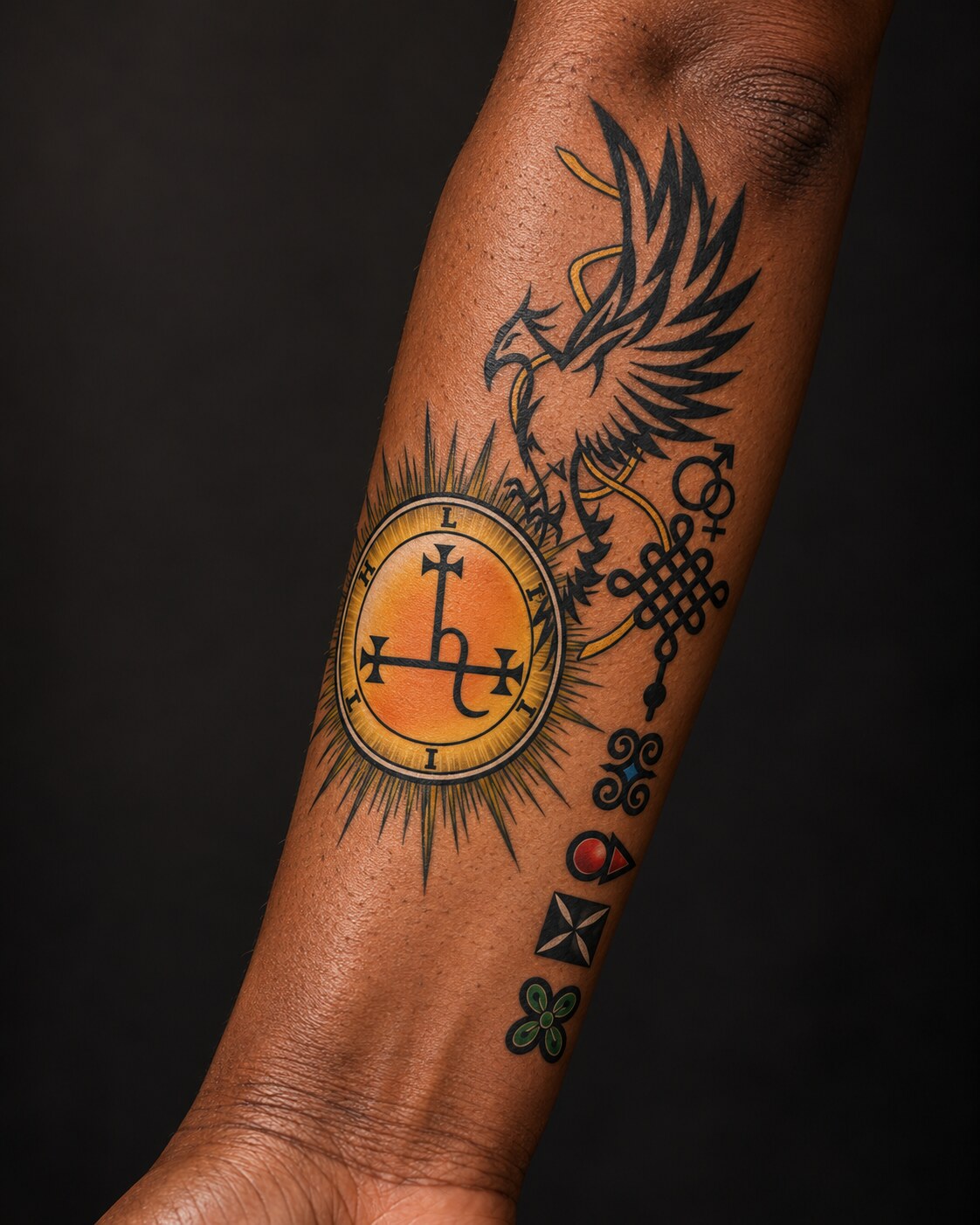 Original symbolic eagle and seal artwork shown as a finished tattoo from a woman’s wrist to elbow